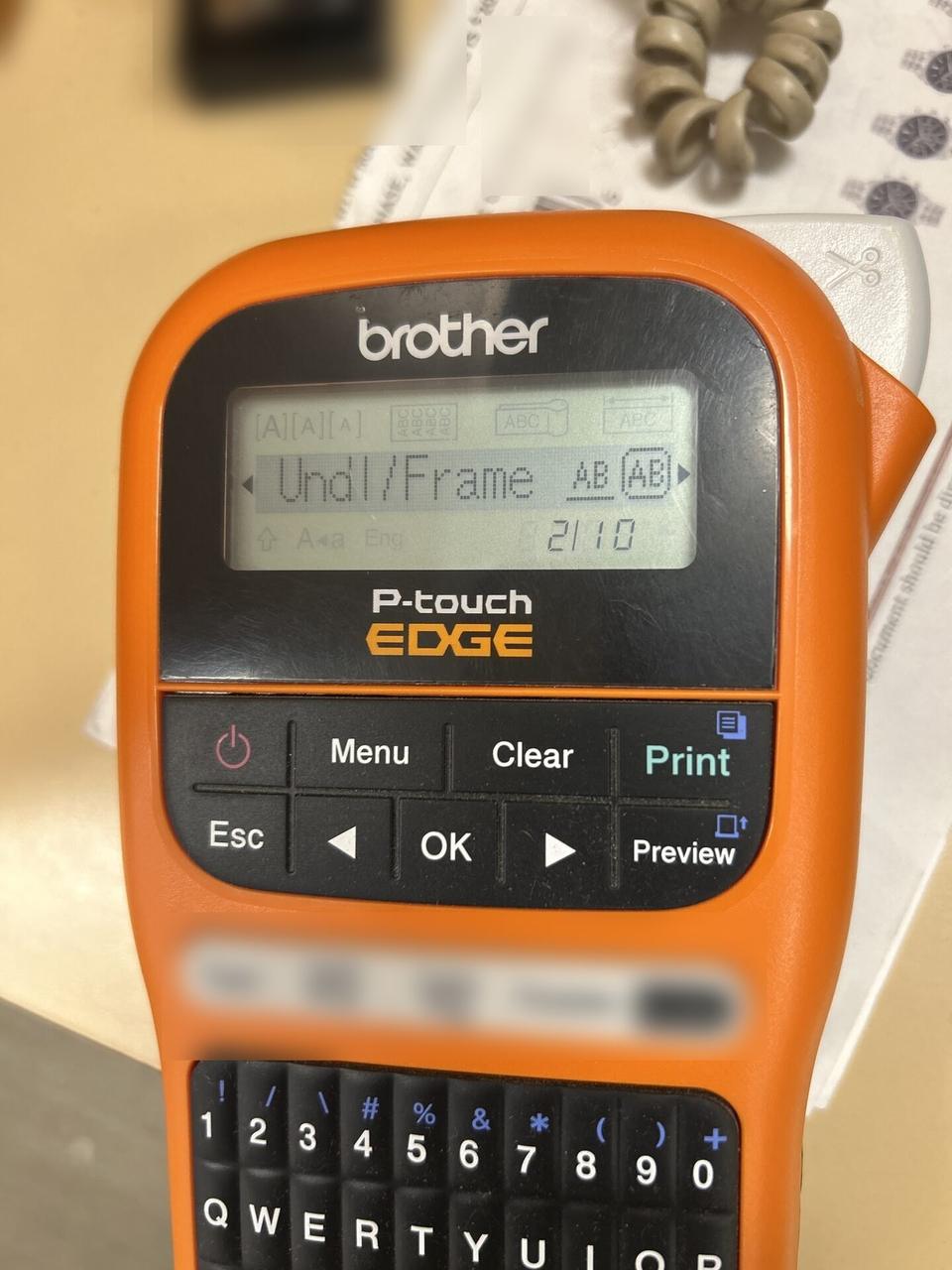 Public-safe portfolio image of label printer used for cable and device labeling