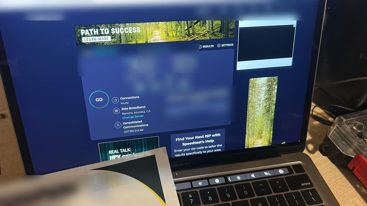 Onsite service photo showing monitor display validation for office technology at the service location