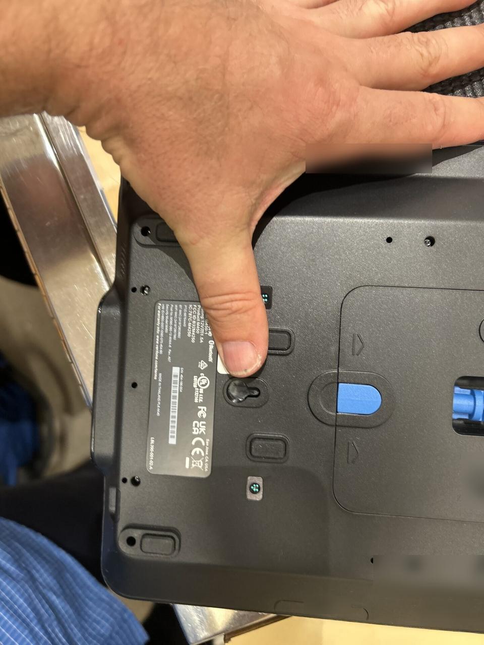 Public-safe portfolio image of VIP phone setup in a public-safe service photo during telephony troubleshooting