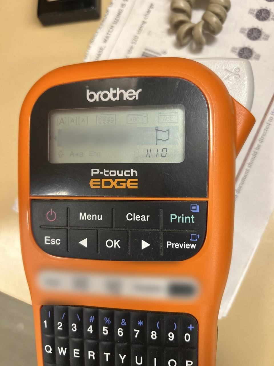 Public-safe portfolio image of label printer used for cable and device labeling