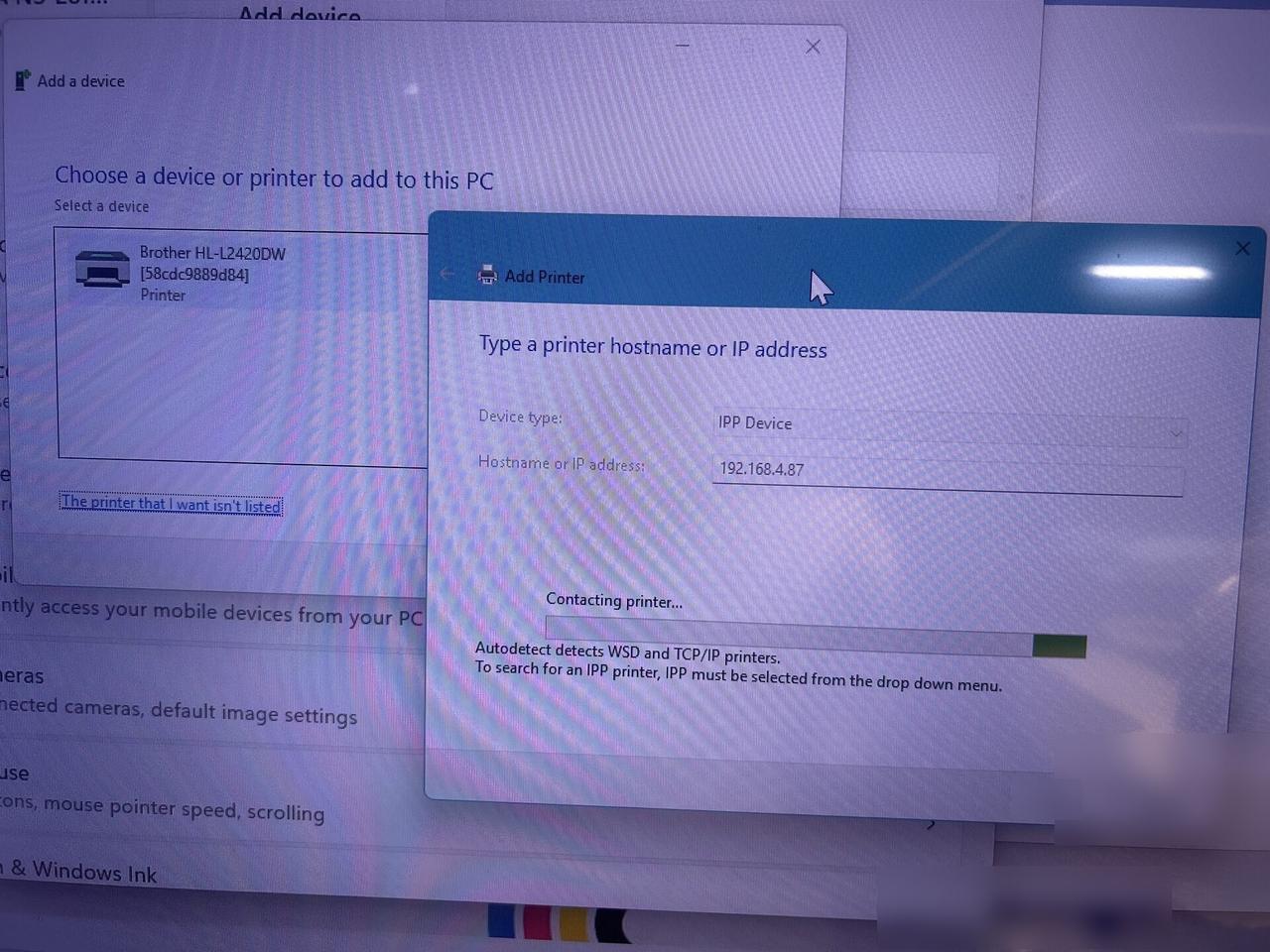 Onsite service photo showing monitor display validation for office technology before final workstation handoff