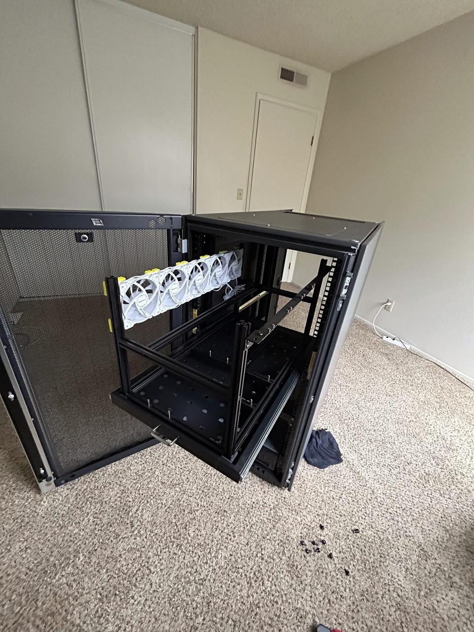Onsite service photo showing empty equipment cabinet or small network rack