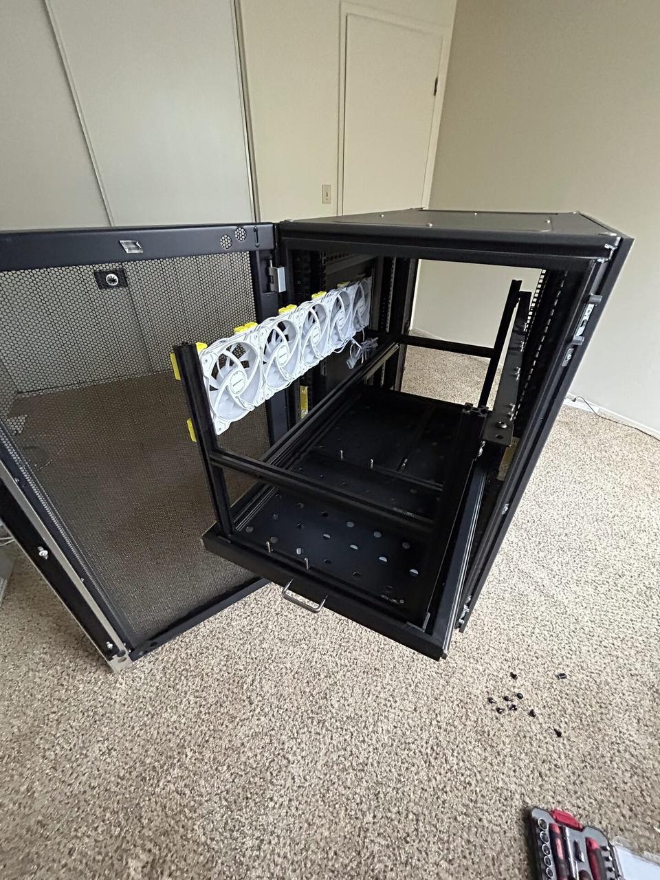 Empty equipment cabinet or small network rack documented for a smart technology service call