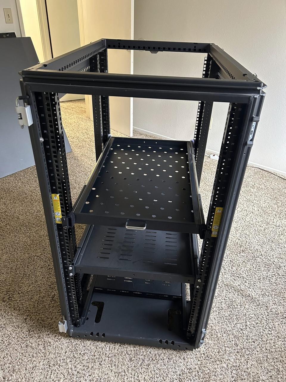 Service documentation showing empty equipment cabinet or small network rack