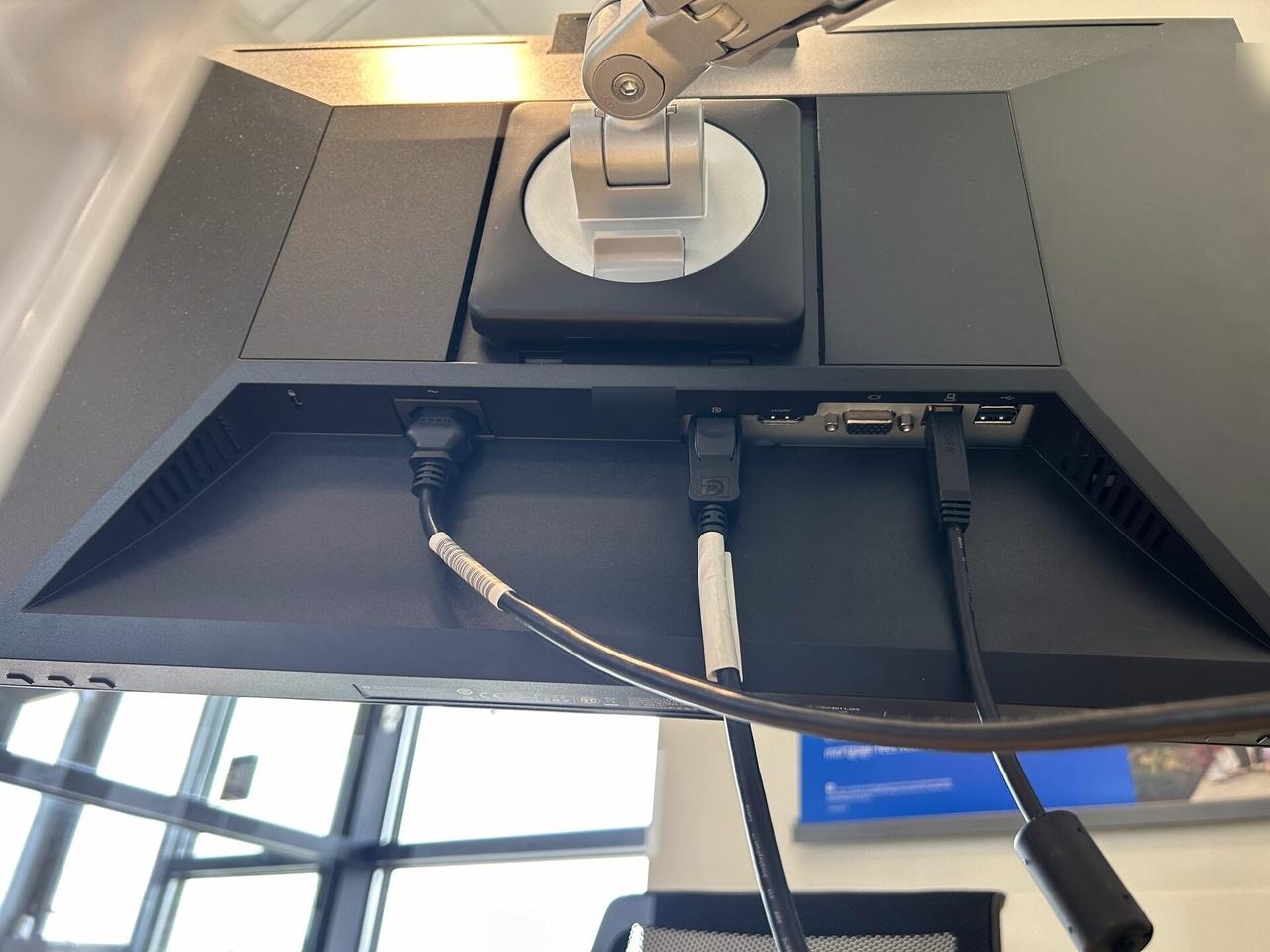 Business workstation hardware and monitor cabling before final user handoff during an Alrty onsite service visit