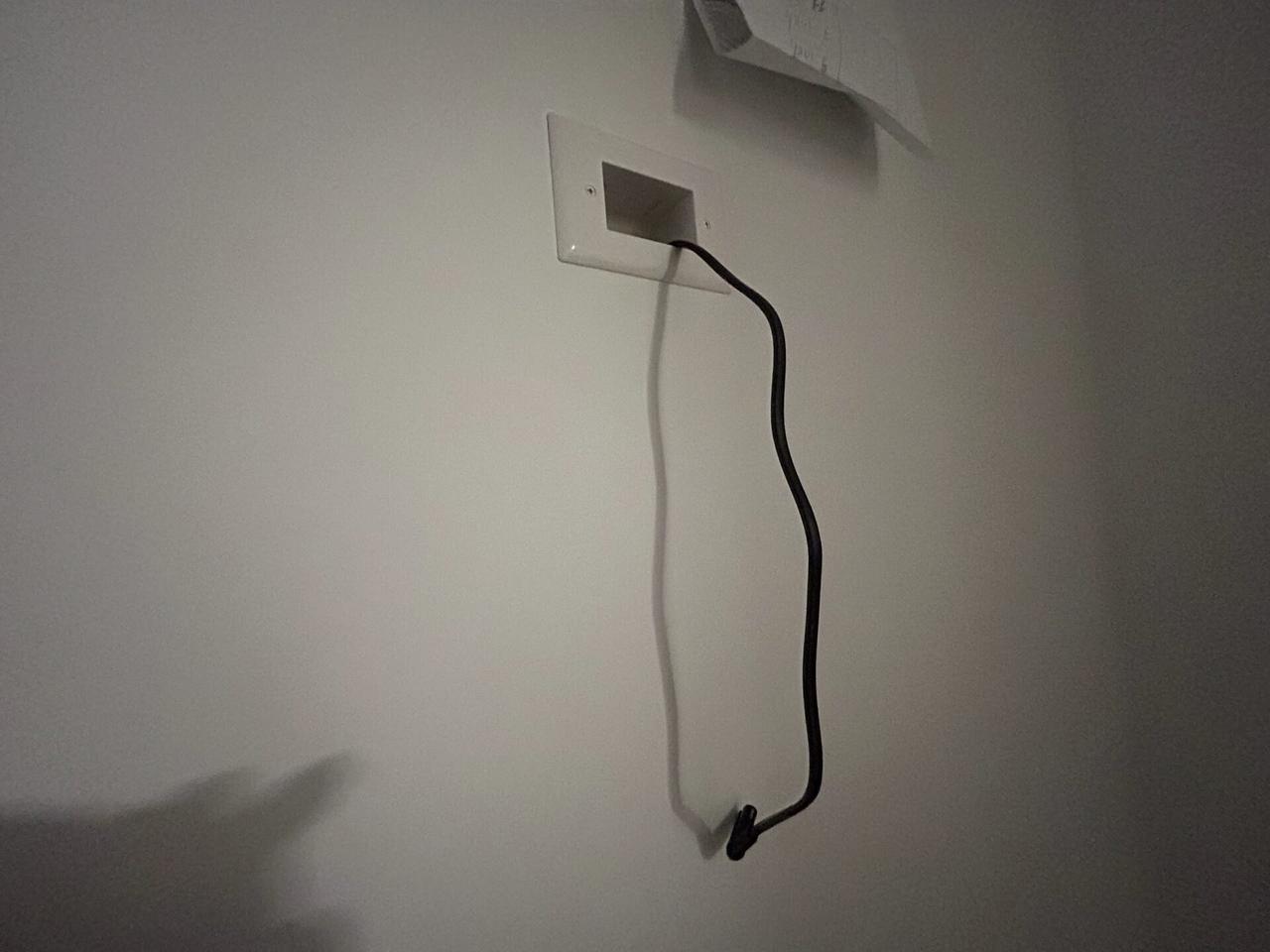 Low-voltage wall plate area for concealed TV cable route