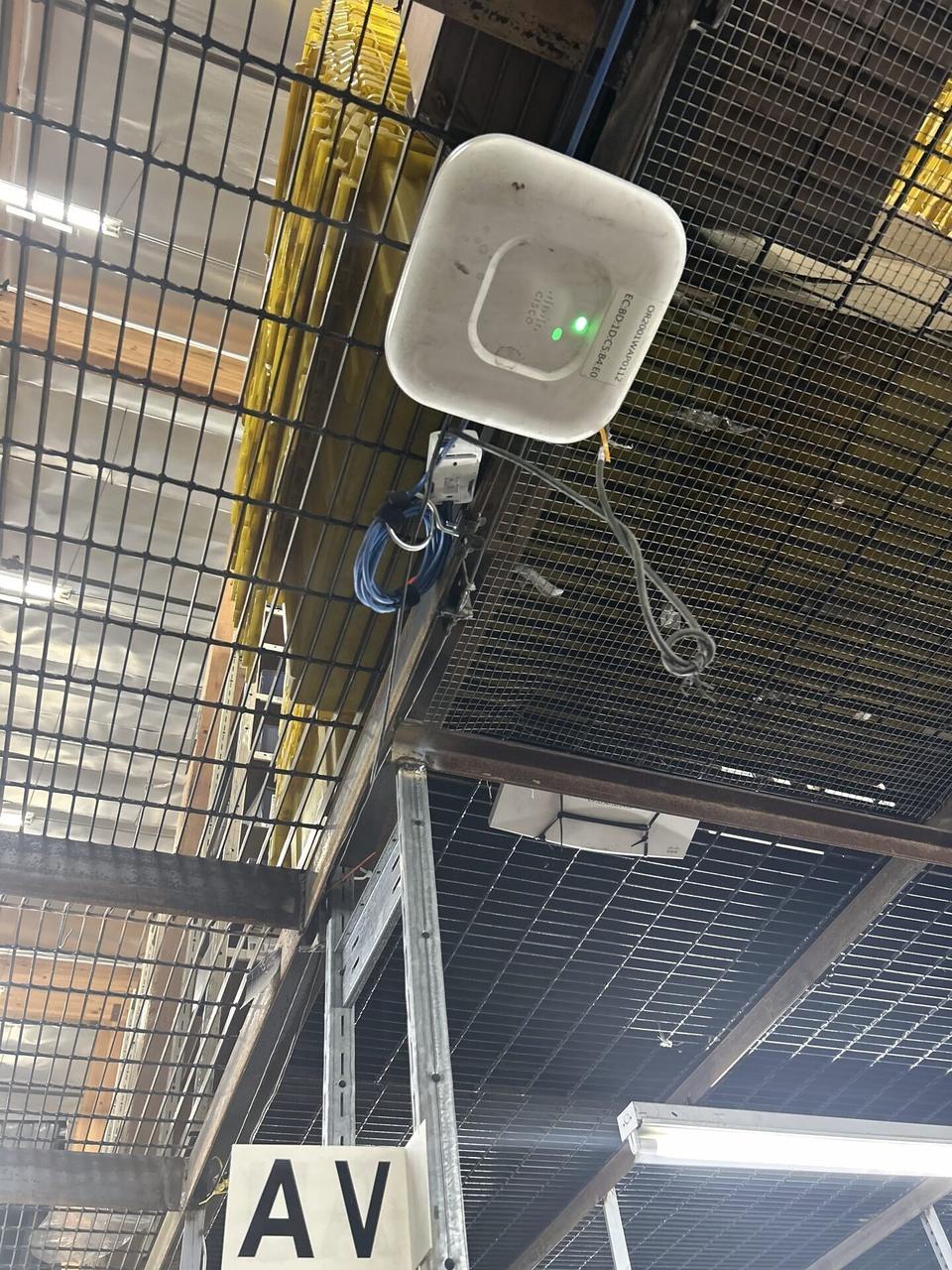 Enterprise retail wireless access point refresh during connectivity validation documented for a smart technology service call