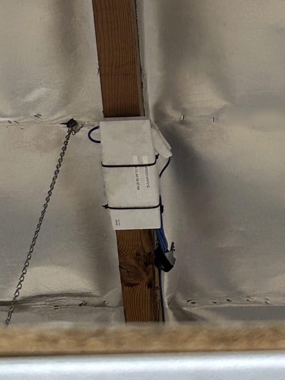 Onsite service photo showing enterprise retail wireless access point refresh before final network testing