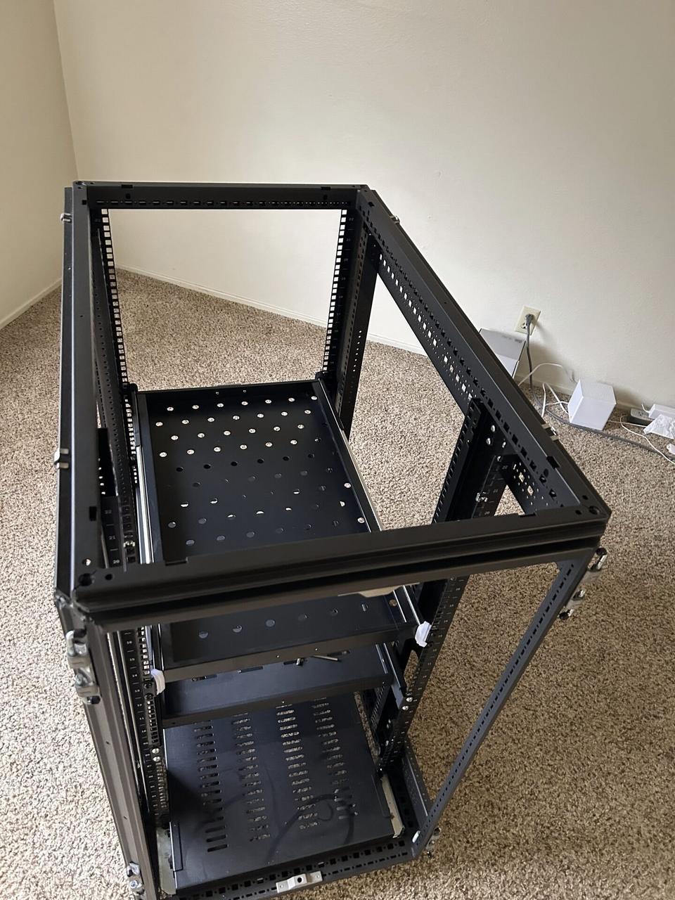Service documentation showing empty equipment cabinet or small network rack