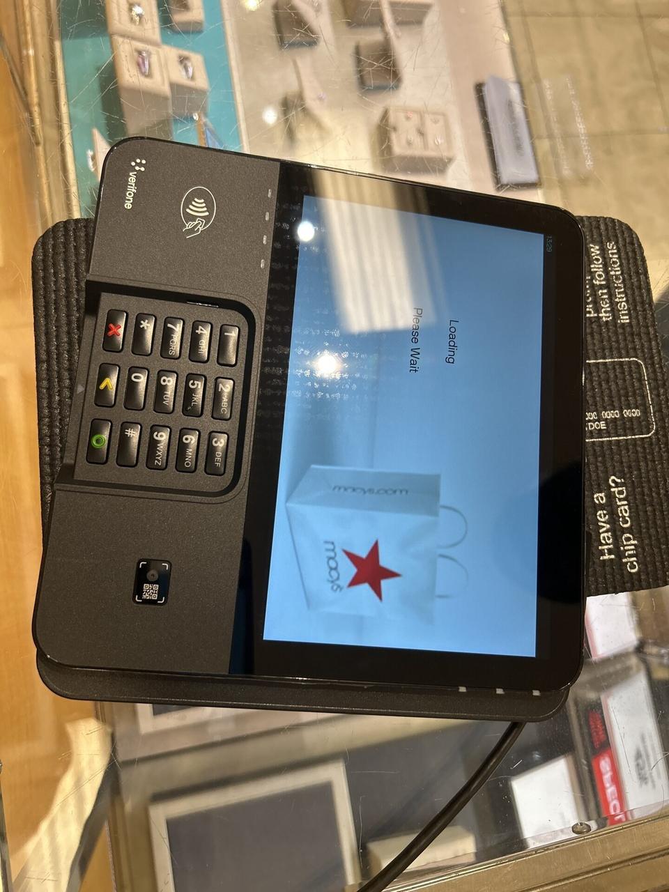 Onsite service photo showing handheld POS or retail service device