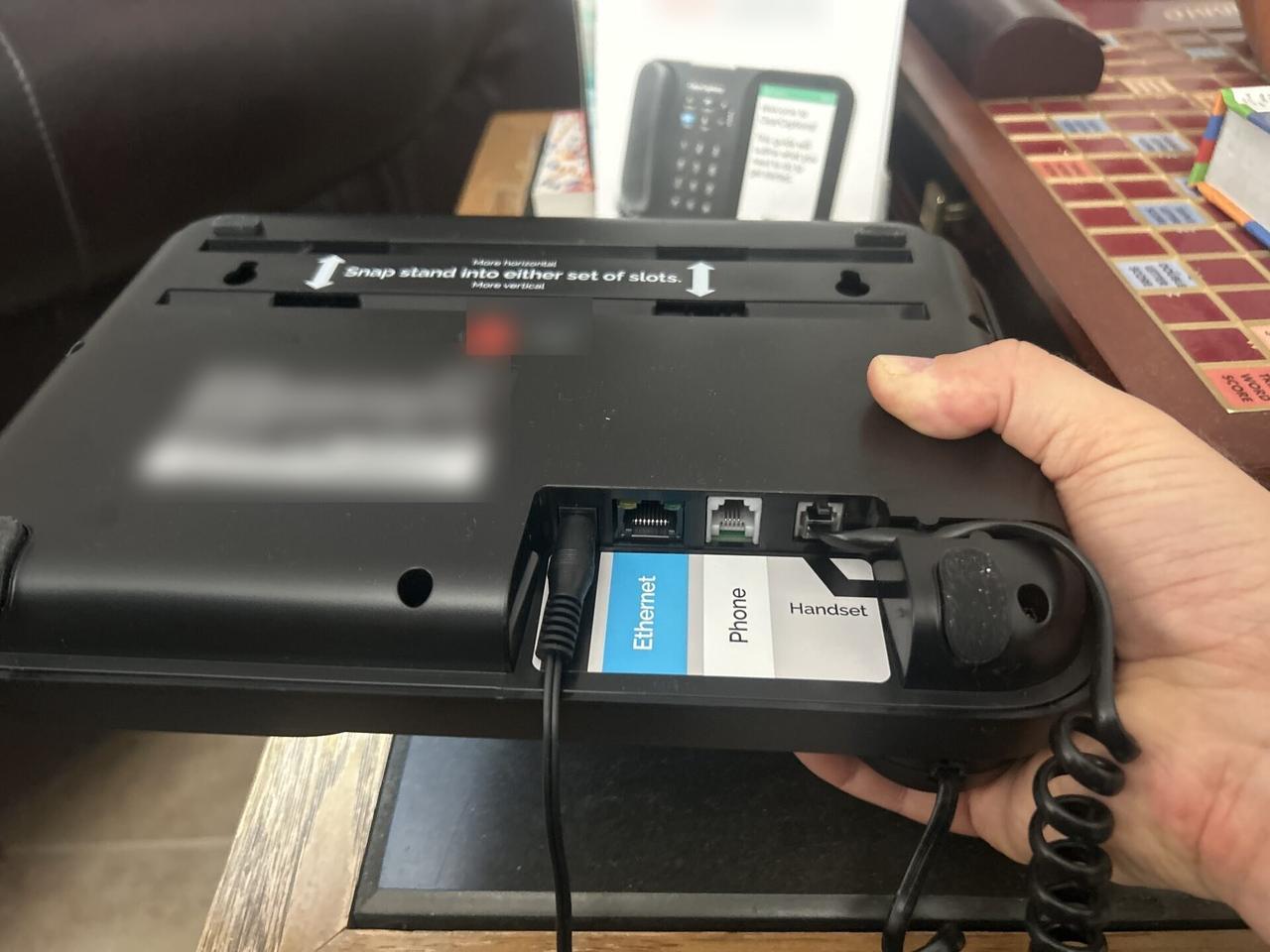 Telephony and VIP phone equipment setup with cabling context visible during an Alrty onsite service visit