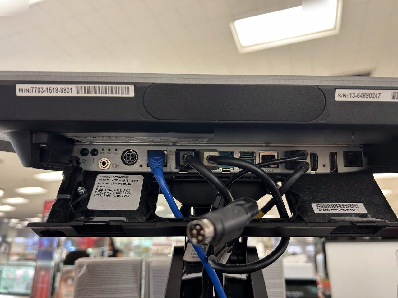 Onsite service photo showing credit-card payment terminal and POS hardware