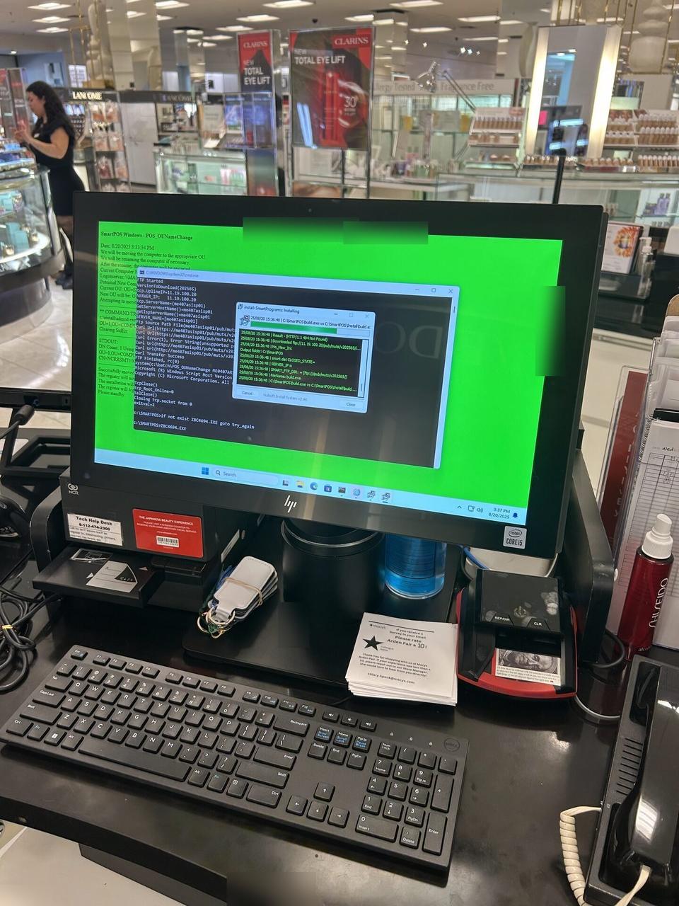 Onsite service photo showing credit-card payment terminal and POS hardware