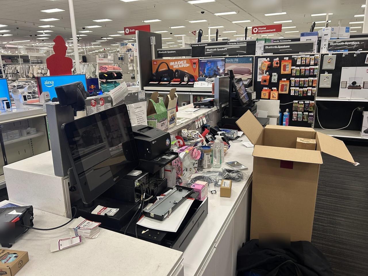 Retail checkout work area with POS terminal hardware during an Alrty onsite service visit