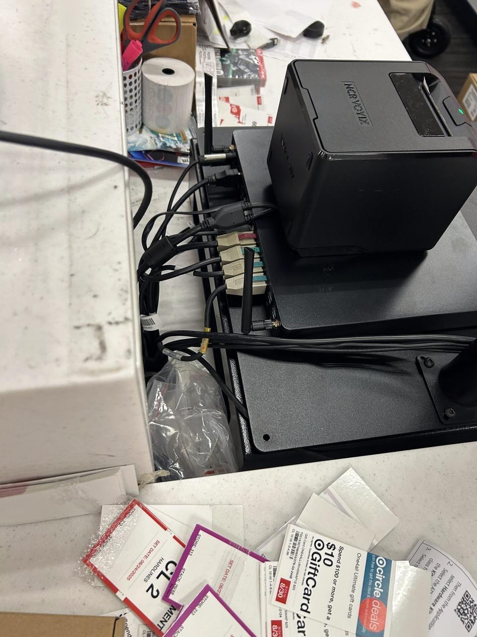 Alrty field photo with checkout station POS hardware at a checkout lane