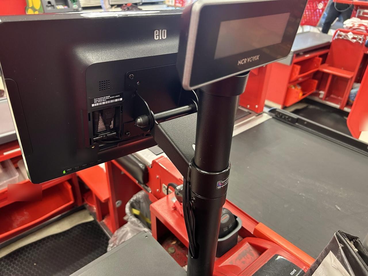 Alrty portfolio view of checkout station POS hardware with cable routing visible