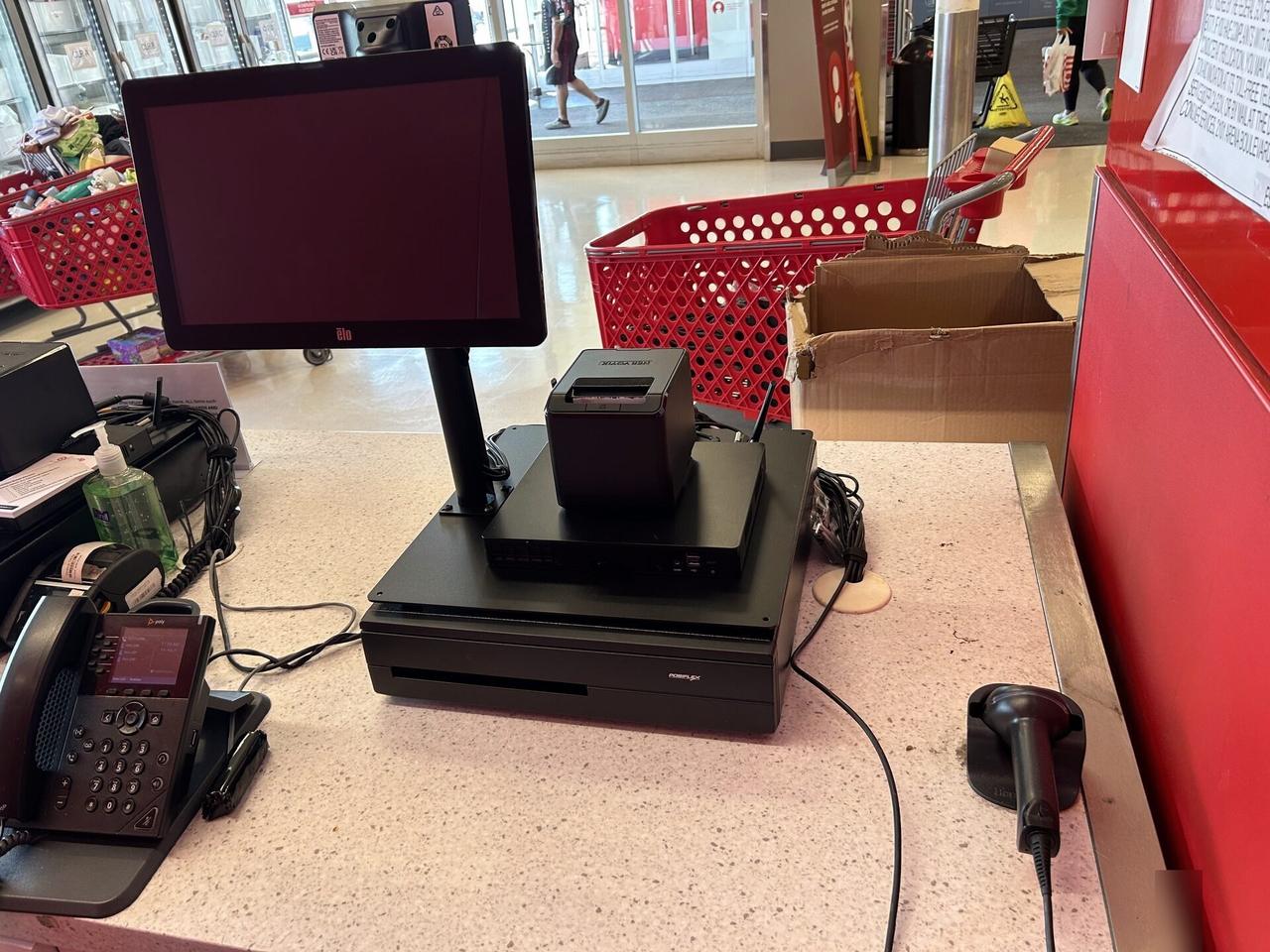 Public-safe portfolio image of checkout station POS hardware before final lane testing
