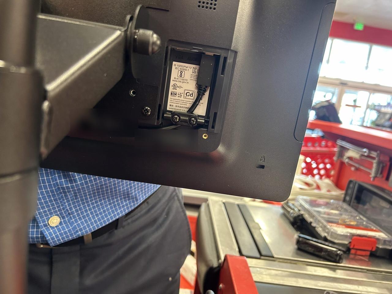 Checkout station POS hardware at the checkout counter documented for a smart technology service call