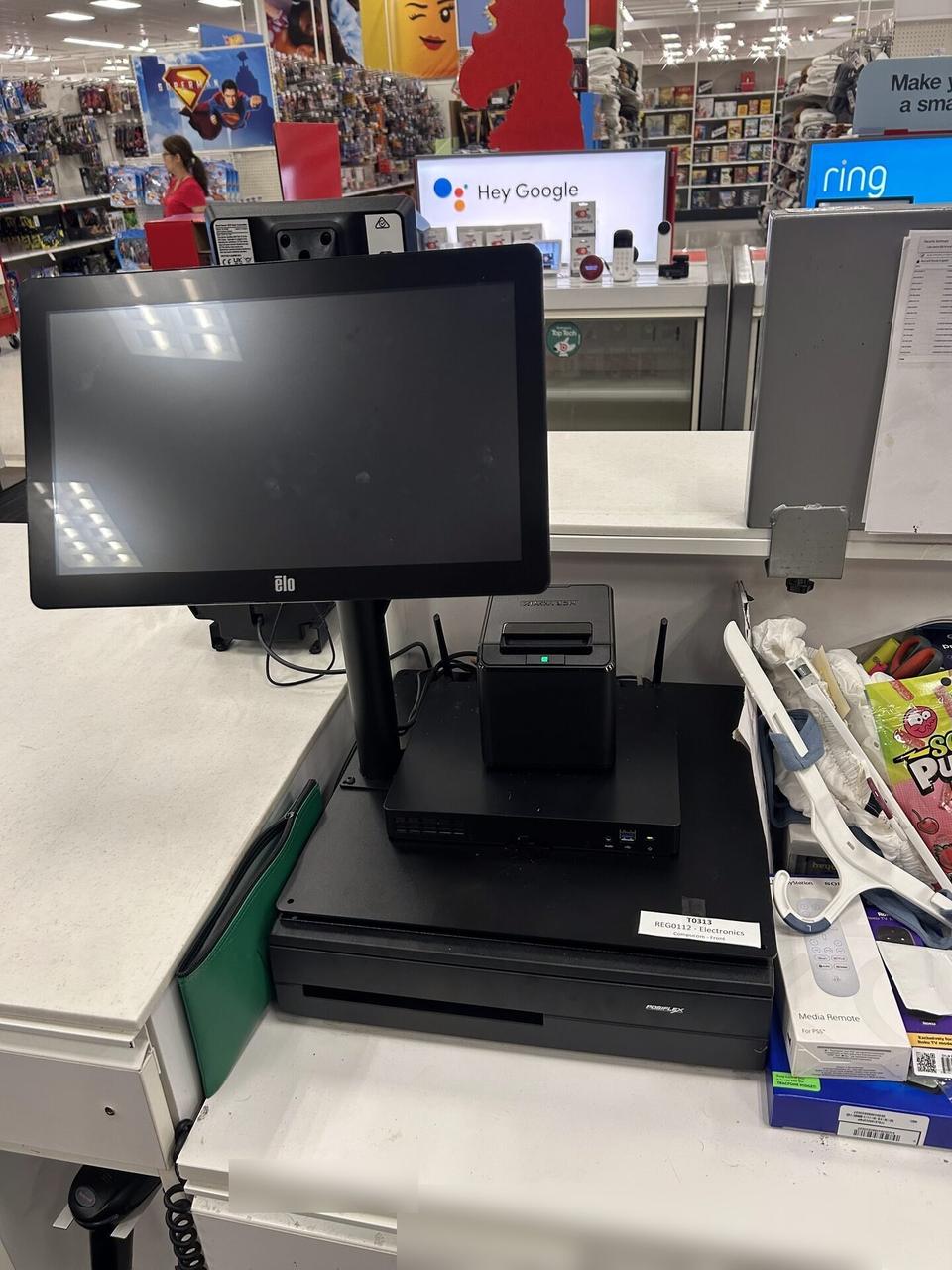 Checkout station POS hardware at a checkout lane documented for a smart technology service call