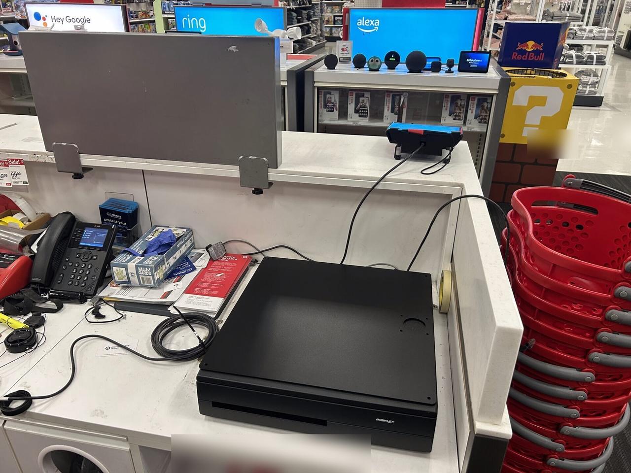 Checkout station POS hardware at a checkout lane documented for a smart technology service call