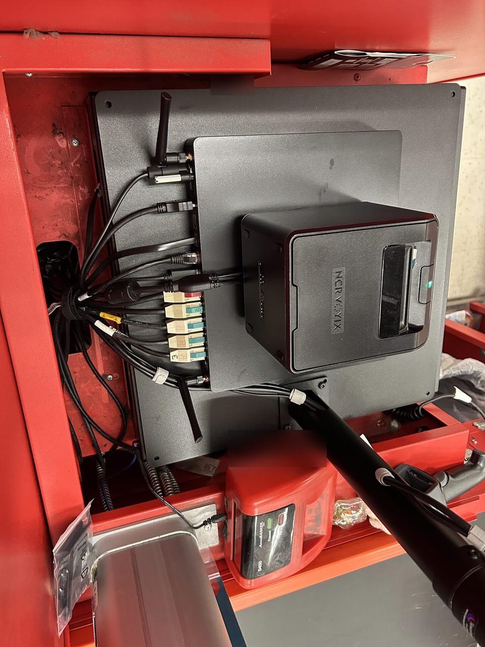 Alrty portfolio view of retail checkout work area with POS terminal hardware
