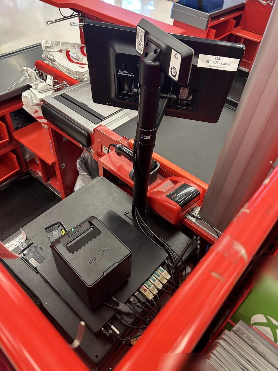 Retail POS lane hardware with register peripherals, cabling and checkout equipment prepared for onsite service