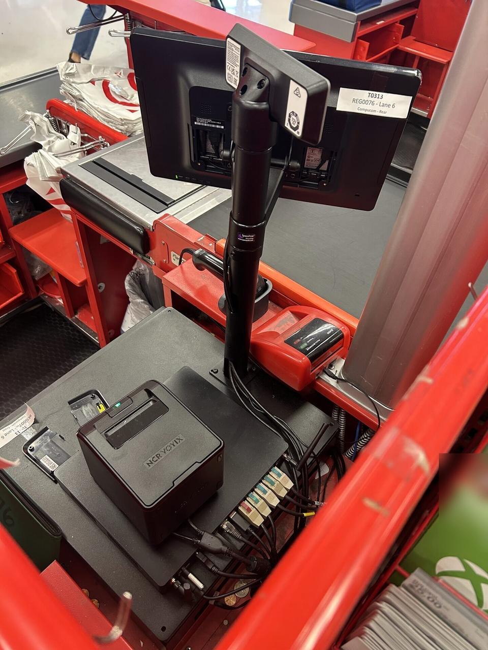 Service documentation showing retail checkout work area with POS terminal hardware