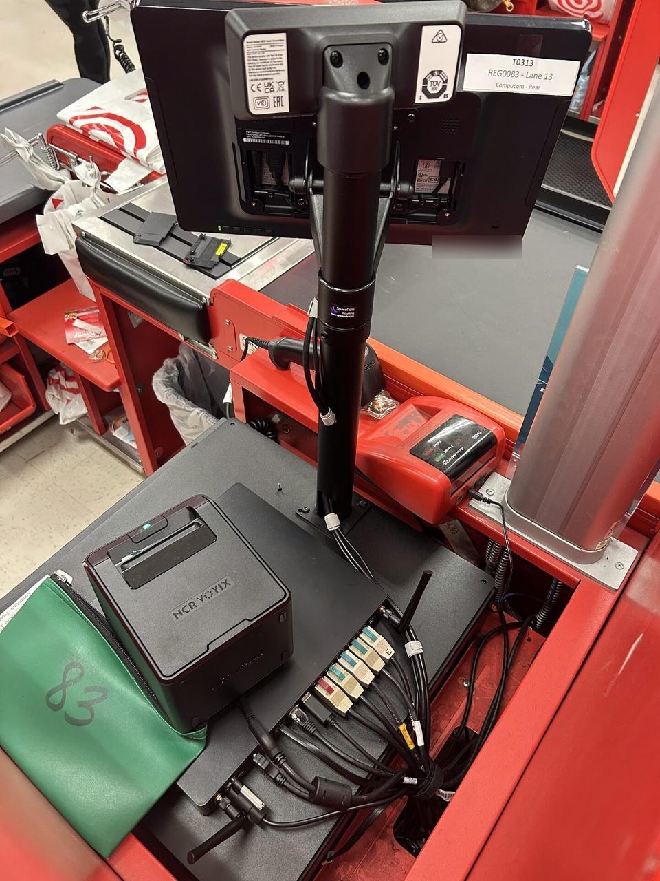 Public-safe portfolio image of retail checkout work area with POS terminal hardware