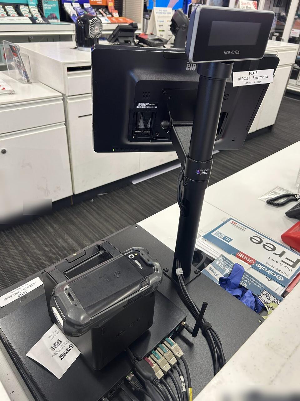 Alrty portfolio view of retail checkout work area with POS terminal hardware