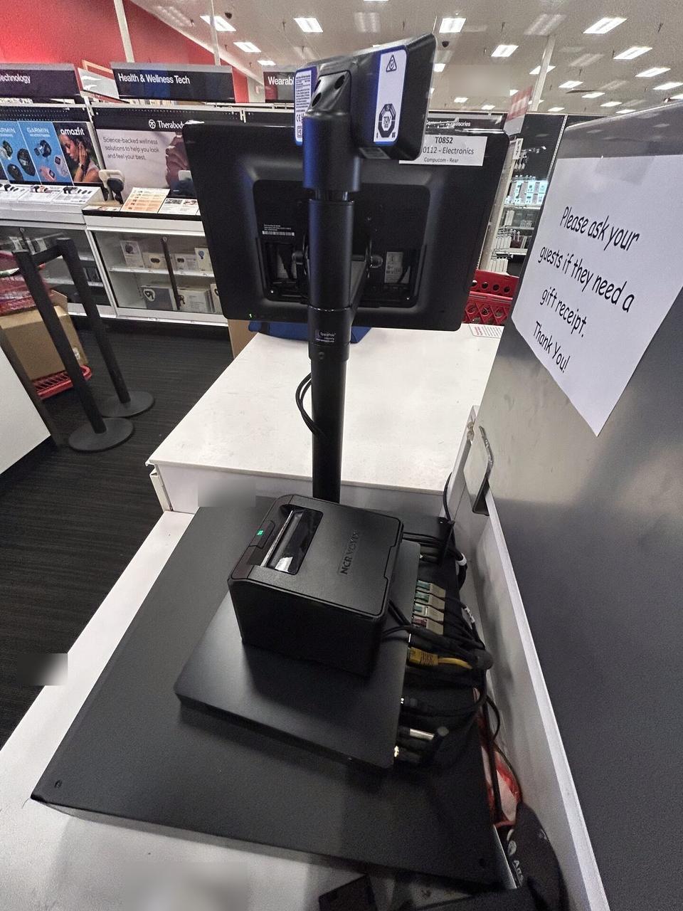 Alrty portfolio view of retail checkout work area with POS terminal hardware