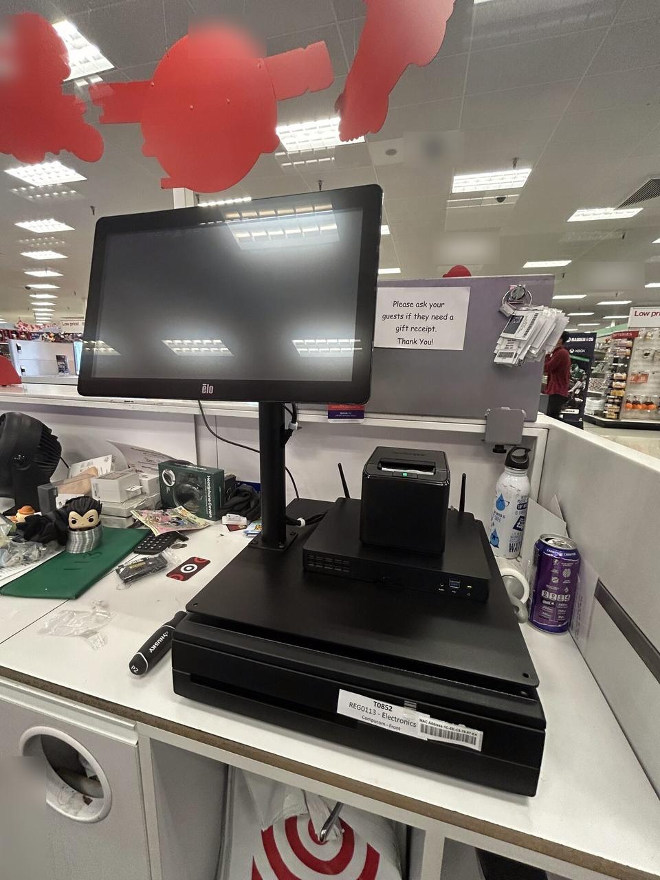 Alrty portfolio view of retail checkout work area with POS terminal hardware