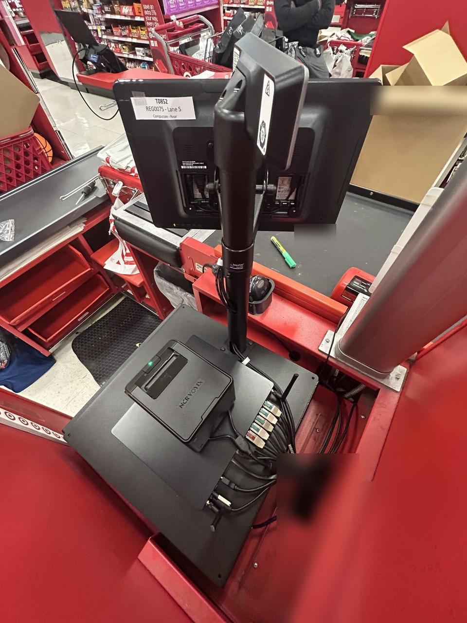 Public-safe portfolio image of retail checkout work area with POS terminal hardware