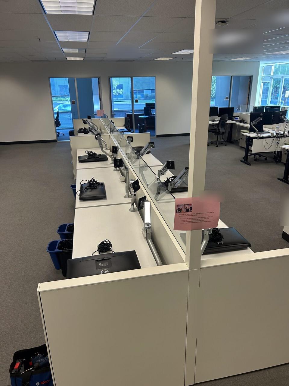 Service documentation showing office workstation setup with monitors at a business workstation