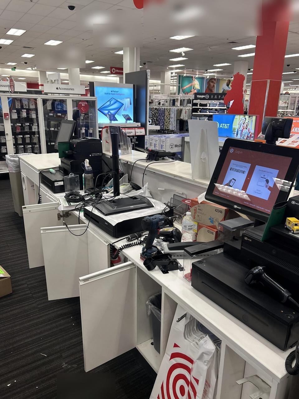 Retail POS lane hardware with register peripherals, cabling and checkout equipment prepared for onsite service