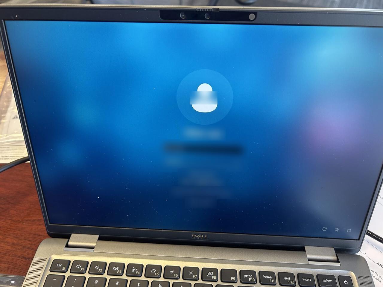 Workstation screen and connected equipment check for office technology support during an Alrty onsite service visit