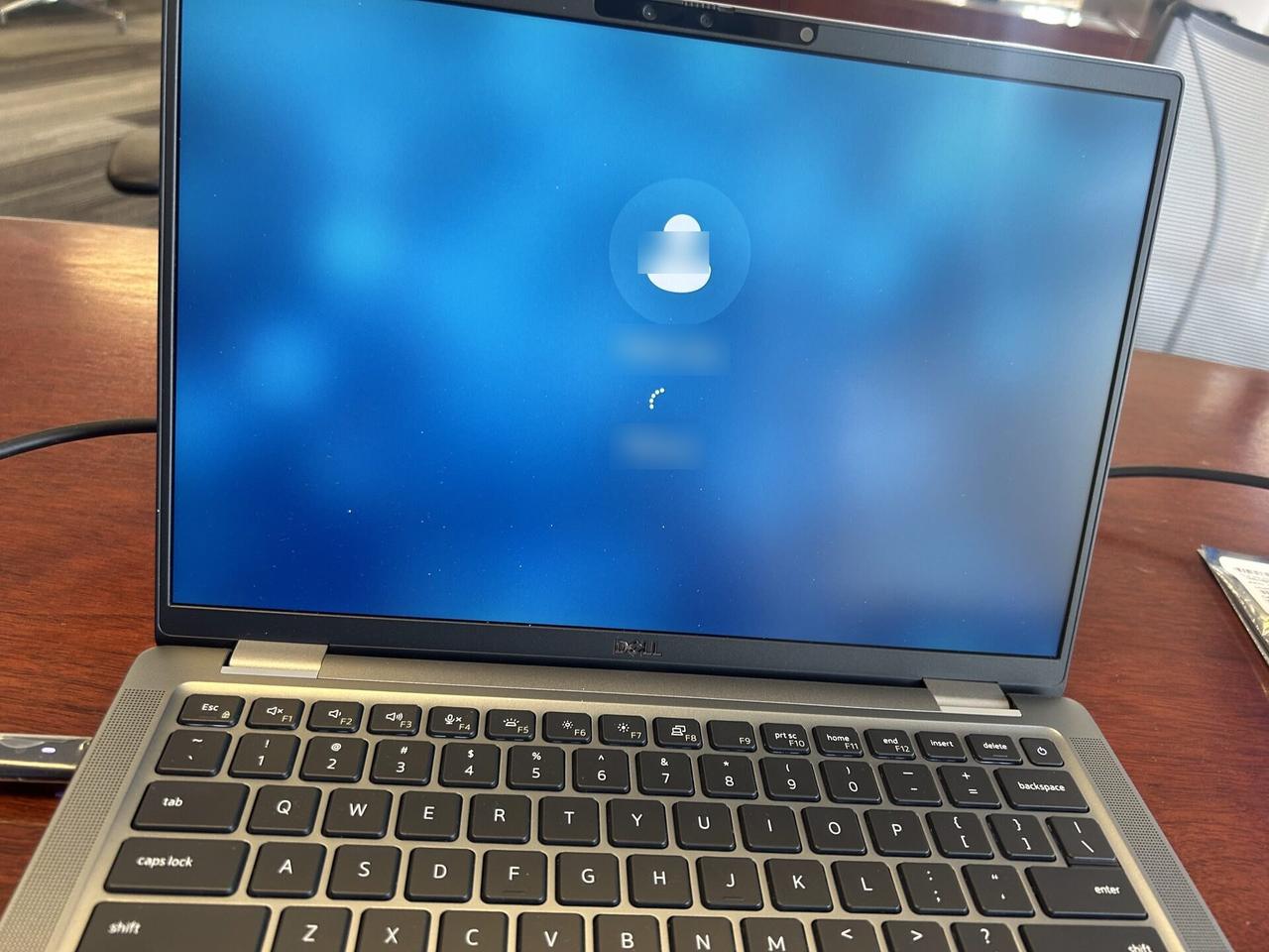 Service documentation showing desktop monitor during service verification at the service location