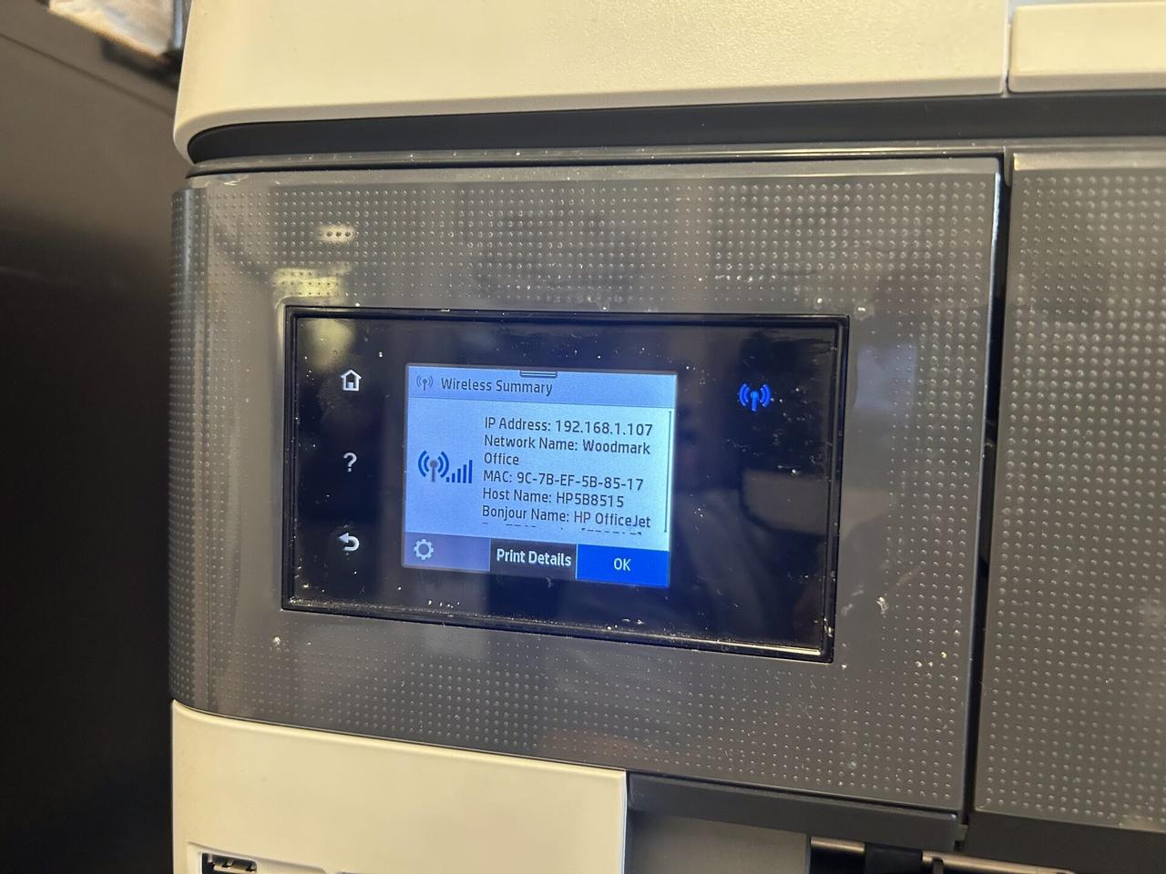 Onsite service photo showing business printer setup at the service location during device setup