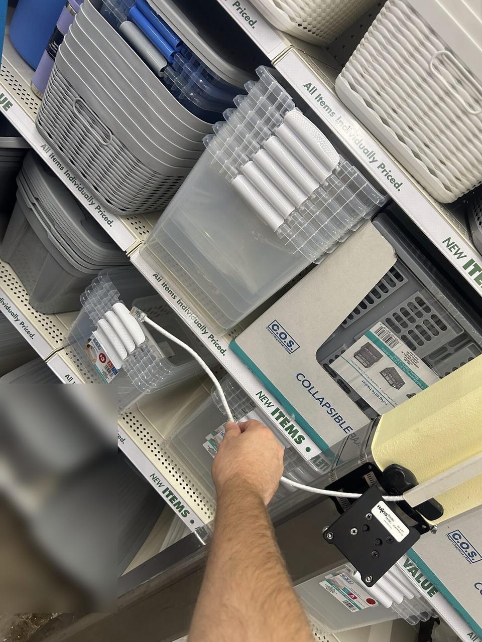 Checkout station cabling and retail device setup with private labels omitted documented for a smart technology service call