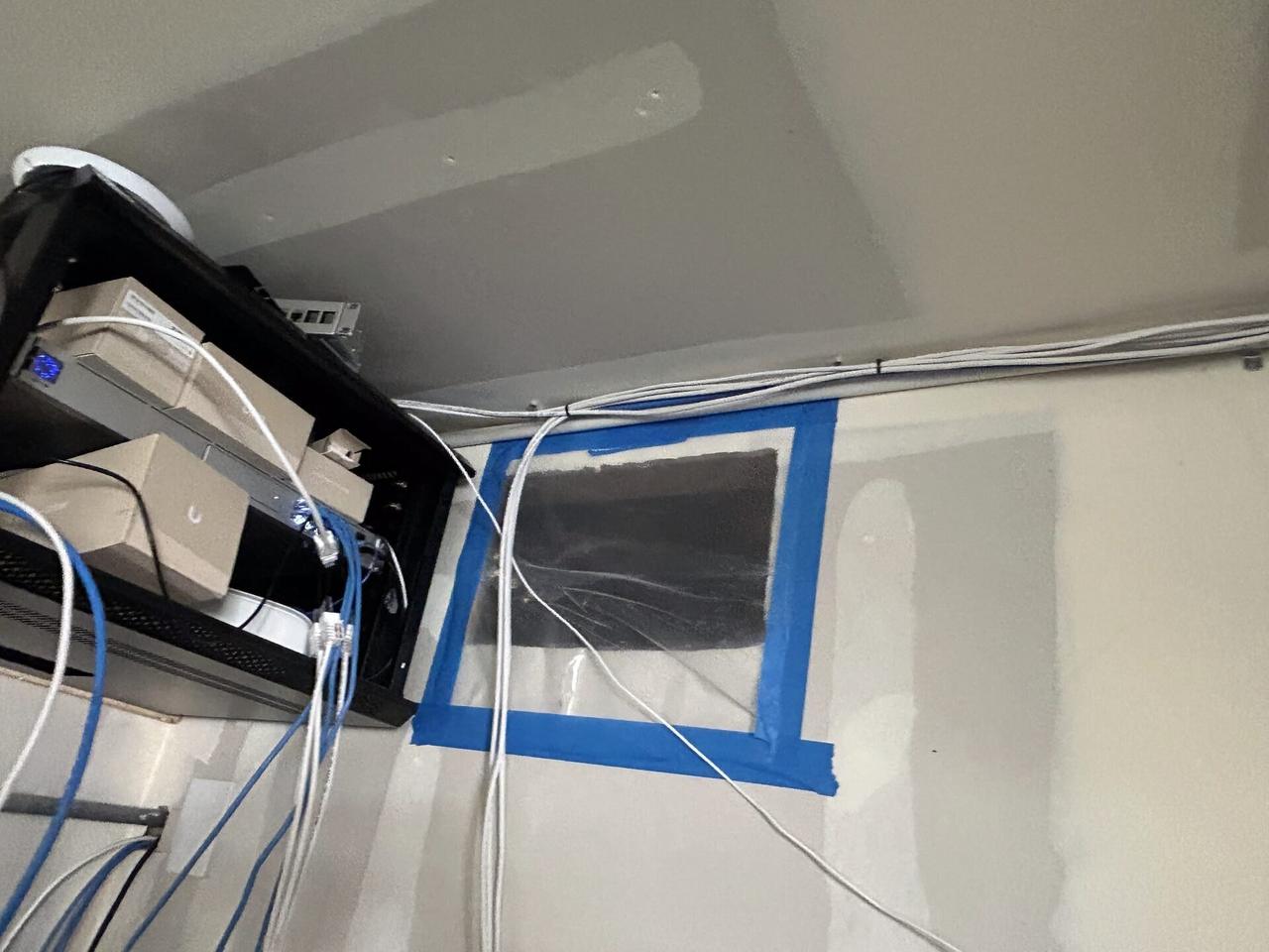 Onsite service photo showing smart security device wiring during onsite work during CCTV equipment service