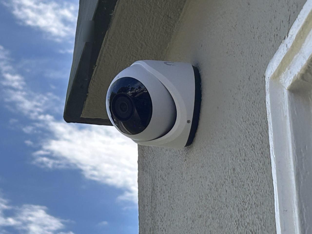 Onsite service photo showing security camera and low-voltage wiring service during CCTV equipment service