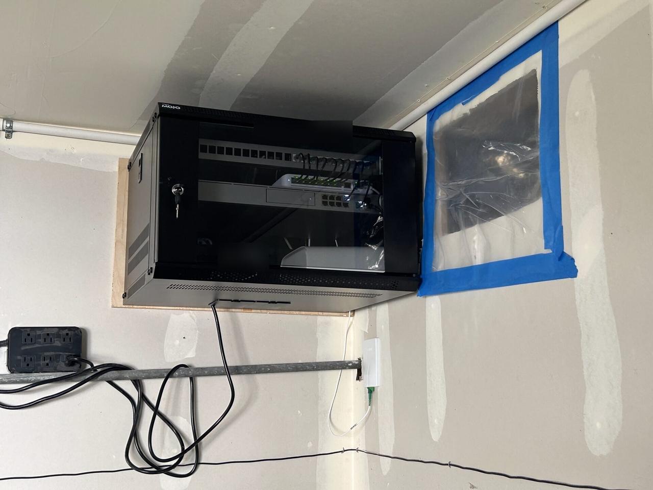 Alrty field photo with CCTV equipment and camera network handoff with mounting context visible