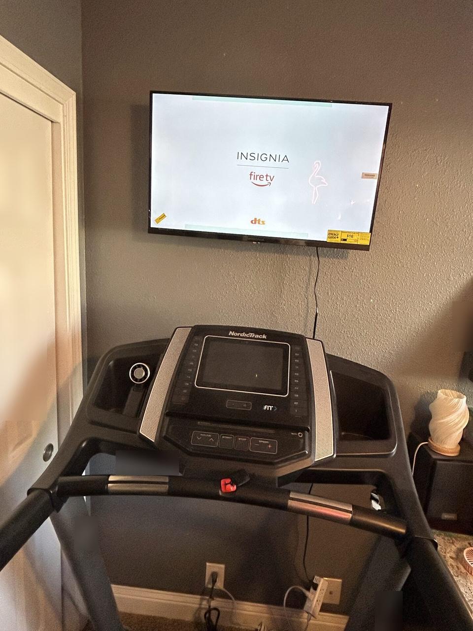 Home theater cabling and display service detail with cable routing visible during an Alrty onsite service visit
