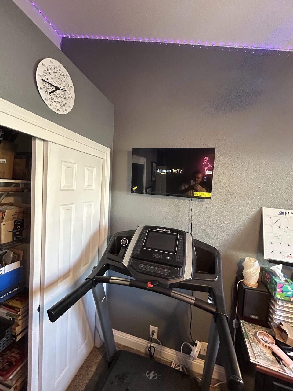 Smart technology service detail: TV mounting and display setup work during TV service preparation