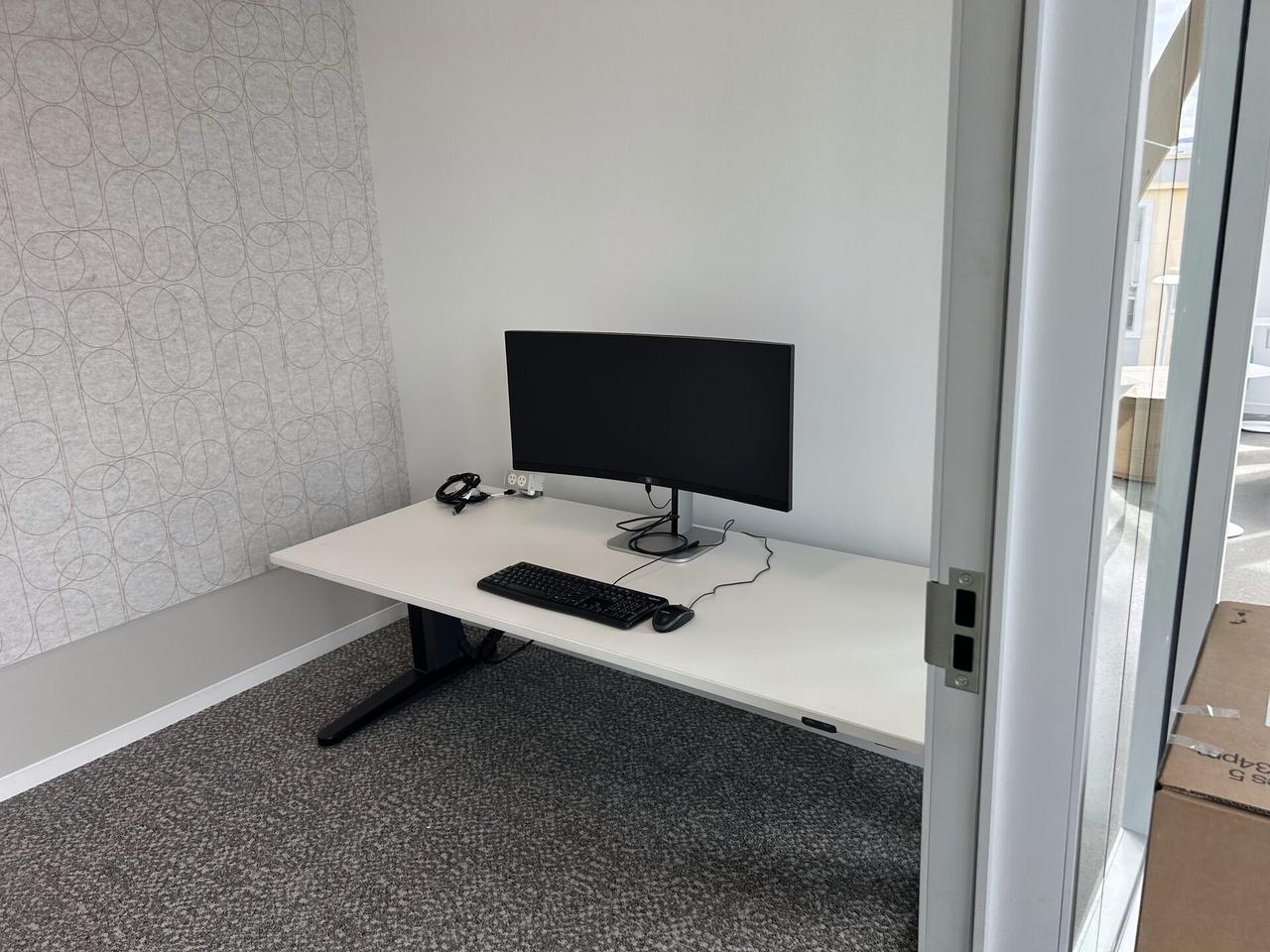 Alrty portfolio view of office workstation setup with monitors during workstation validation