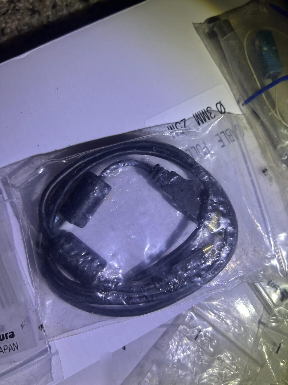 Fiber splicing and cable preparation detail during fiber preparation documented for a smart technology service call