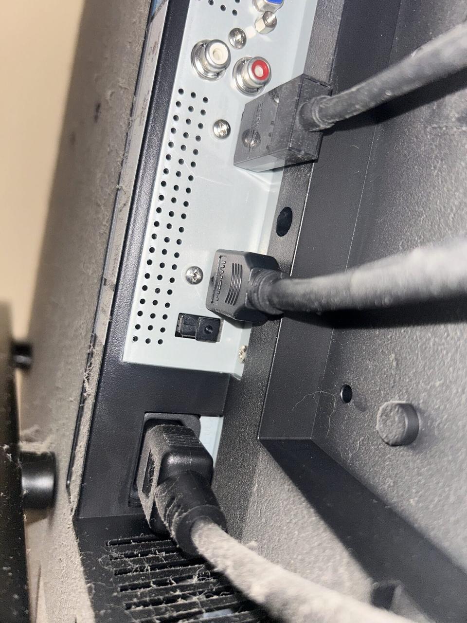Smart technology service detail: home theater cabling and display service detail before final viewing checks