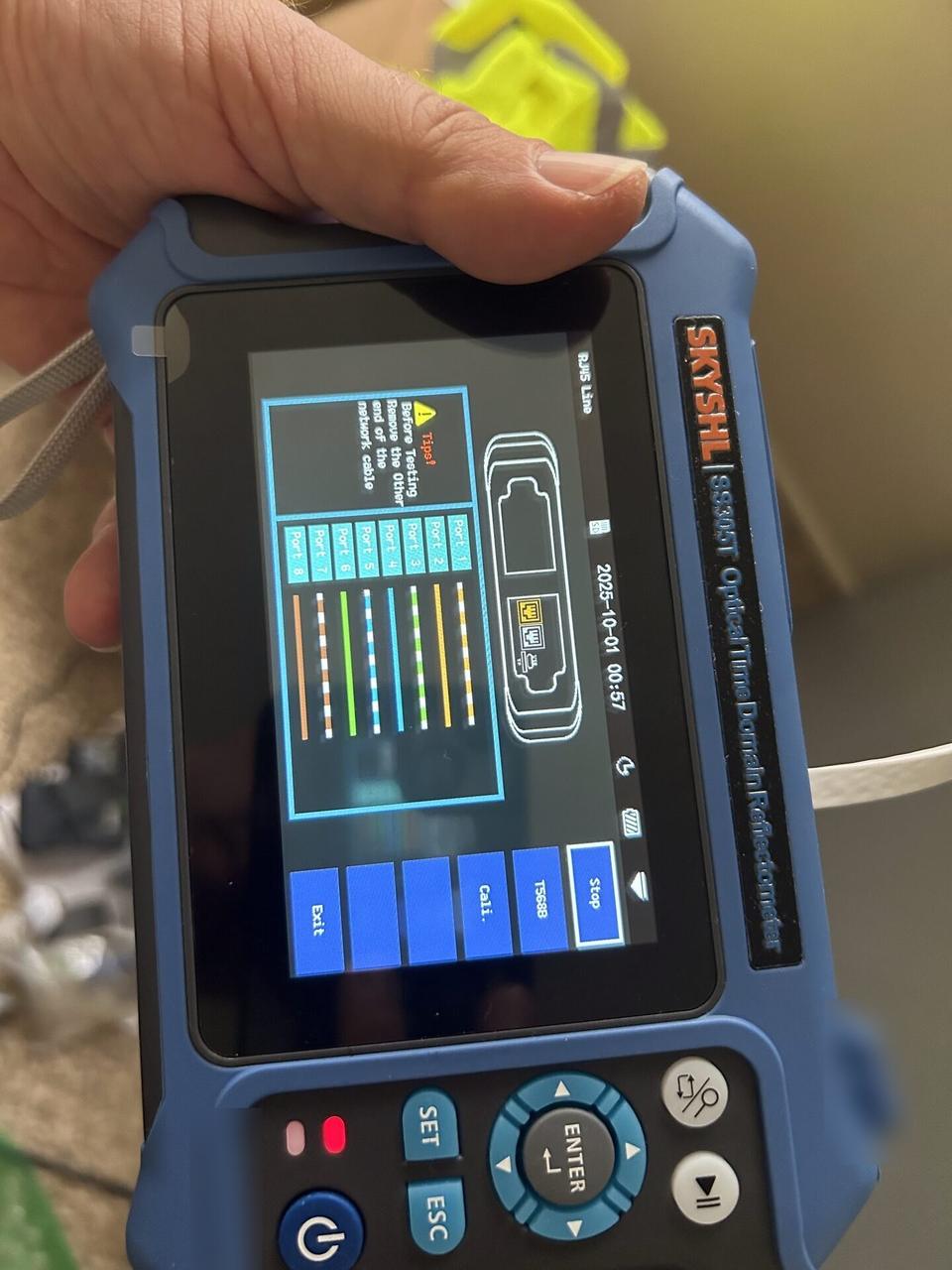 Optical and Cat5/Cat6 cable meter measuring distance on wire pairs documented for a smart technology service call