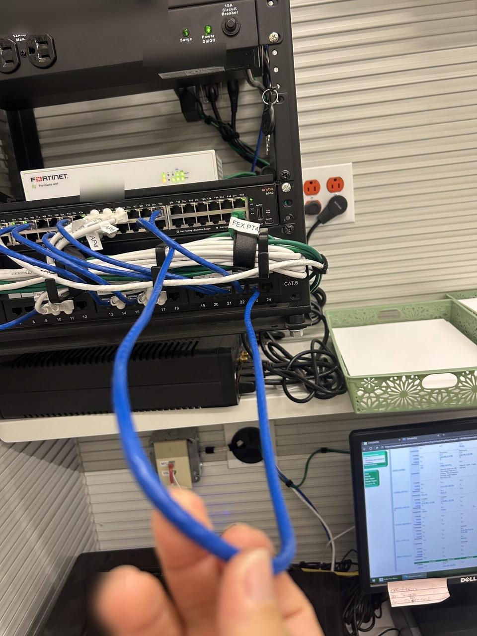 Smart technology service detail: rack-mounted network hardware during service inside the equipment cabinet