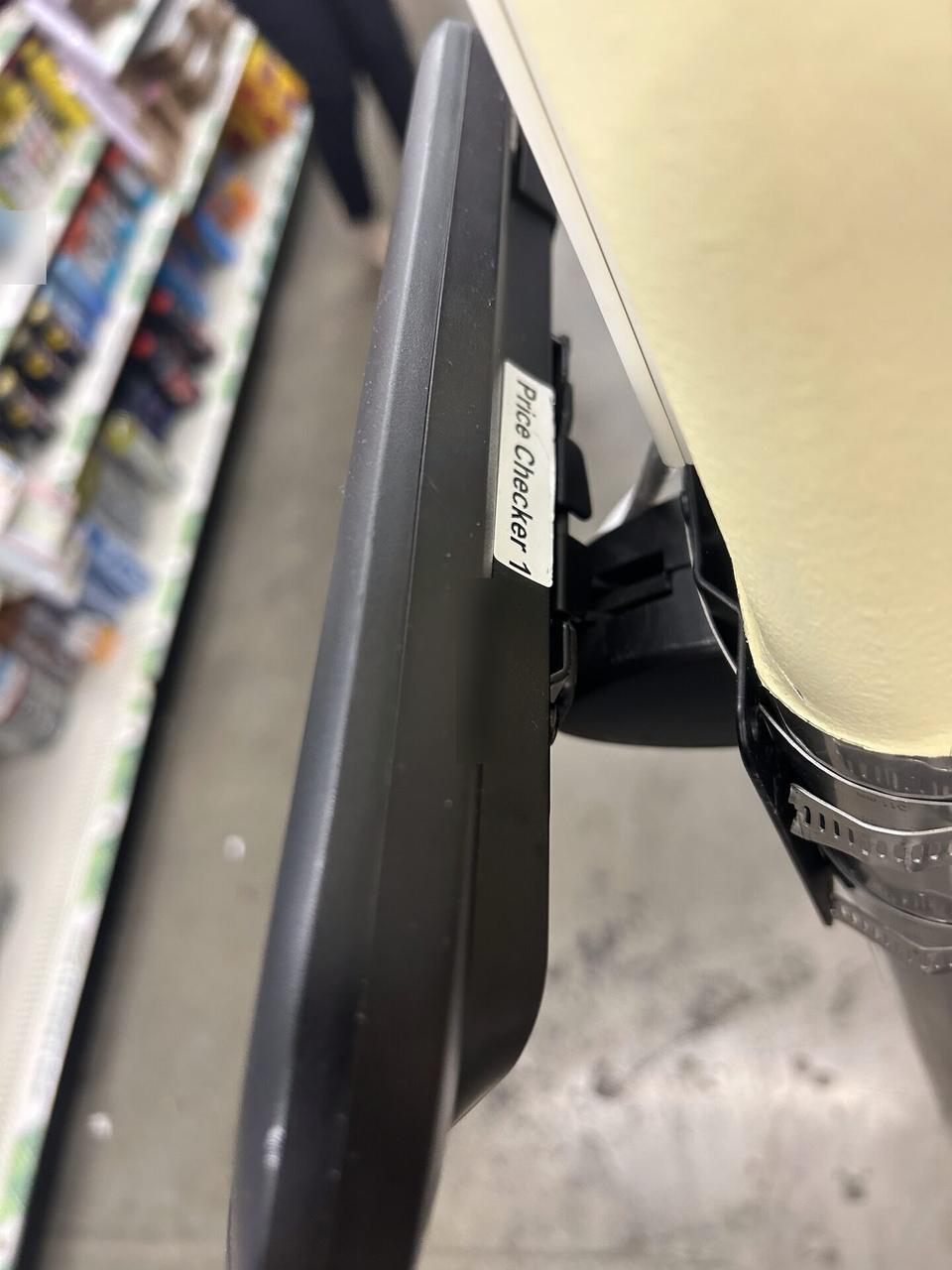 Alrty field photo with POS workstation hardware at a retail service lane before final lane testing