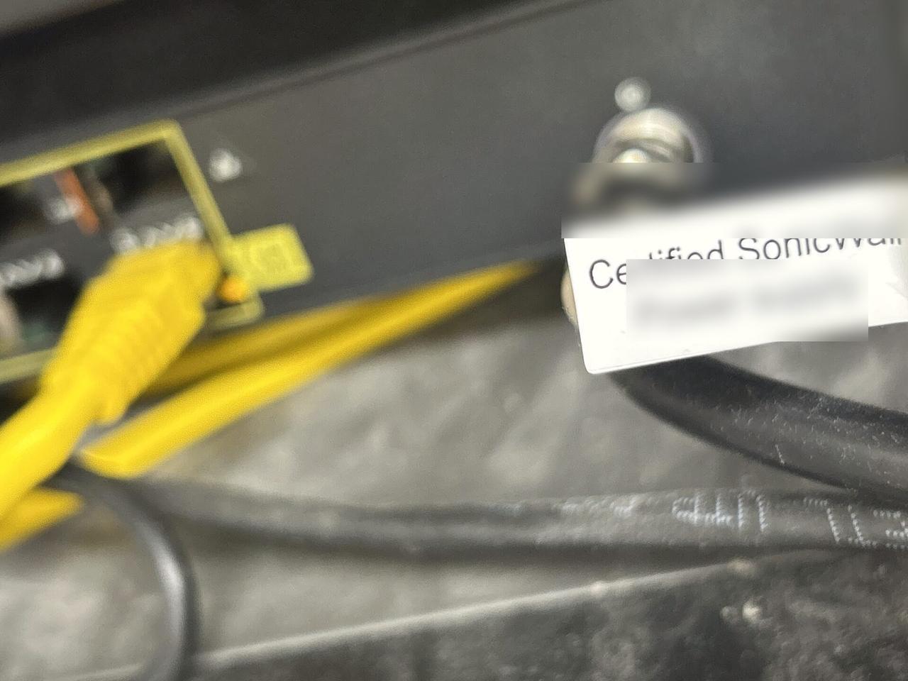 Alrty portfolio view of low-voltage hardware and device cabling at the device handoff point
